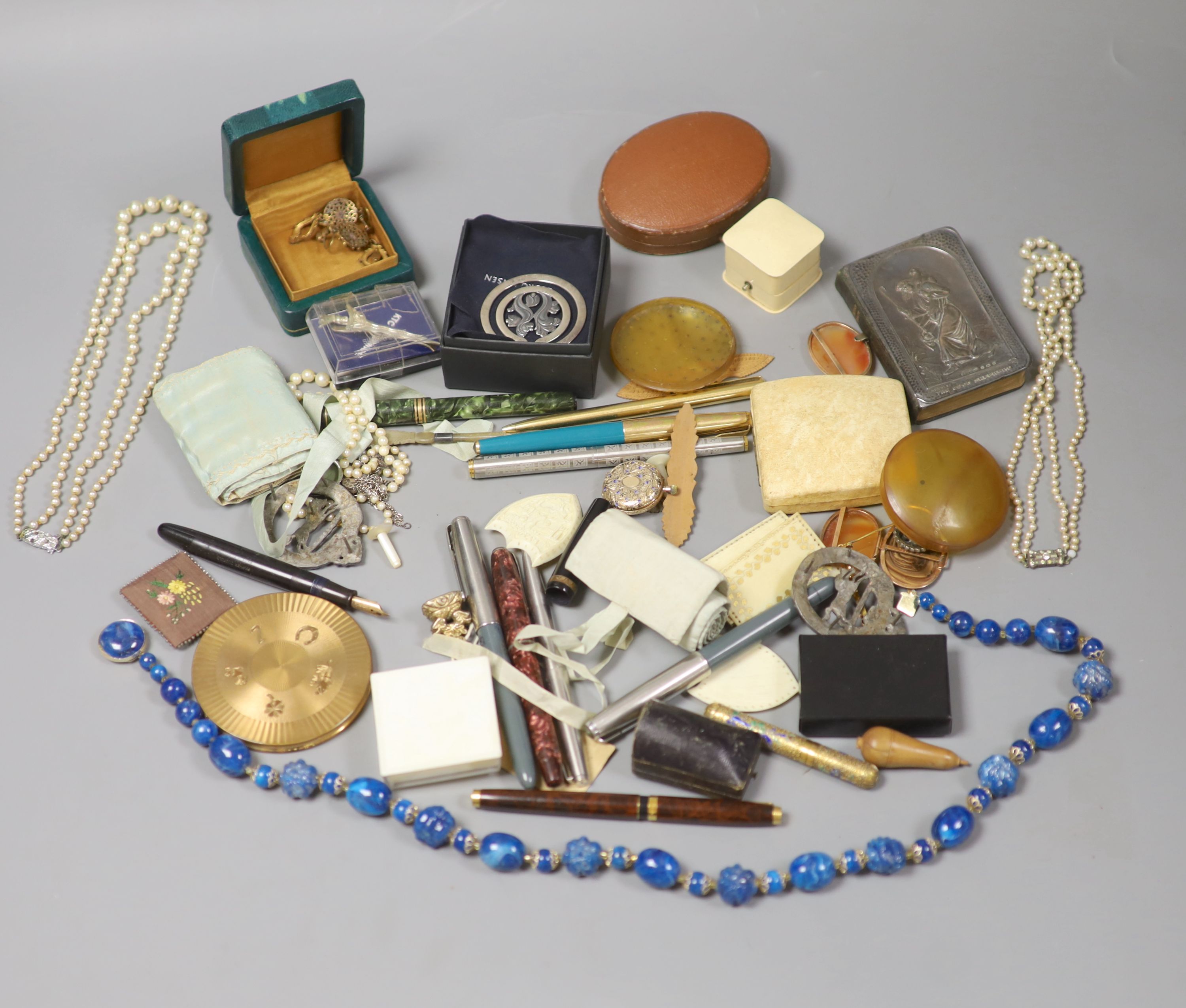 A mixed quantity of jewellery and collectables including 14lk fob watch, a cased set of three yellow metal dress studs, a 9ct opal and seed pearl brooch, a 9ct ring, Georg Jensen clip, costume jewellery, pens etc
